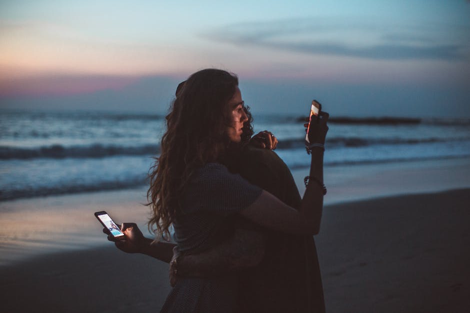 A person holding their phone, with a super long text message displayed on the screen, illustrating the idea of an excessively long text message.