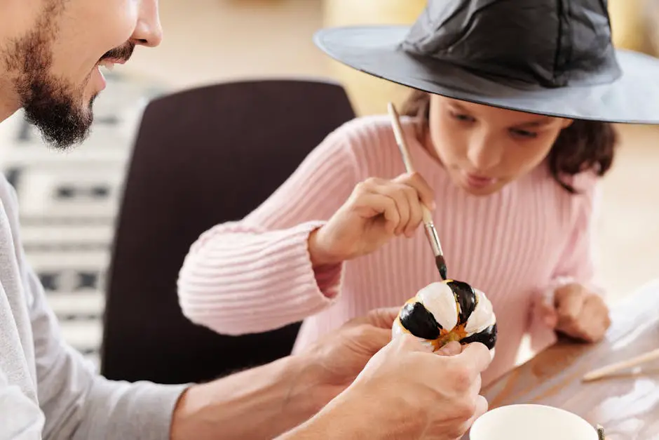 Toddlers creating Halloween-themed crafts at home